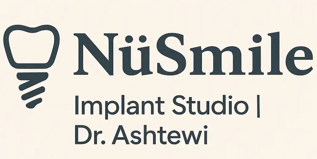 NuSmile Implant Studio logo featuring a tooth and dental implant design, representing advanced dental care and services by Dr. Ashtewi.