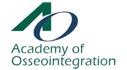 Logo of the Academy of Osseointegration, featuring a stylized green "A" and blue "O" with the text "Academy of Osseointegration" in green, representing Dr. Ashtewi's professional affiliation and commitment to advanced prosthodontic education.