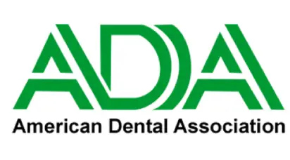 American Dental Association (ADA) logo featuring green stylized letters "ADA" above the full name in black, representing a trusted dental organization.